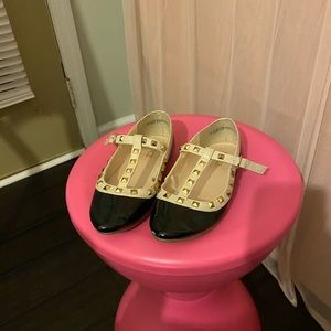 Little girls black children place dress shoes